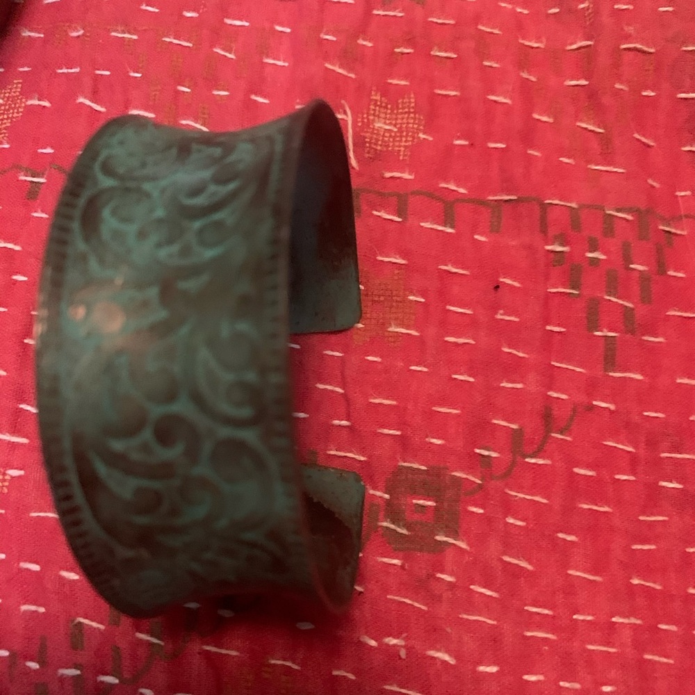 A patena, silver braclet